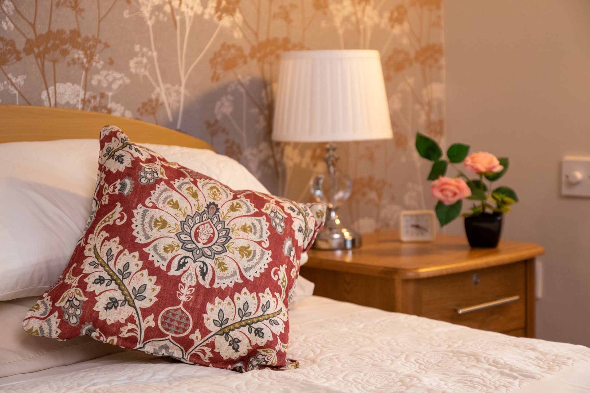 Close up of bed and new soft furnishings in show bedroom at Cranford Care Home in Aberdeen.