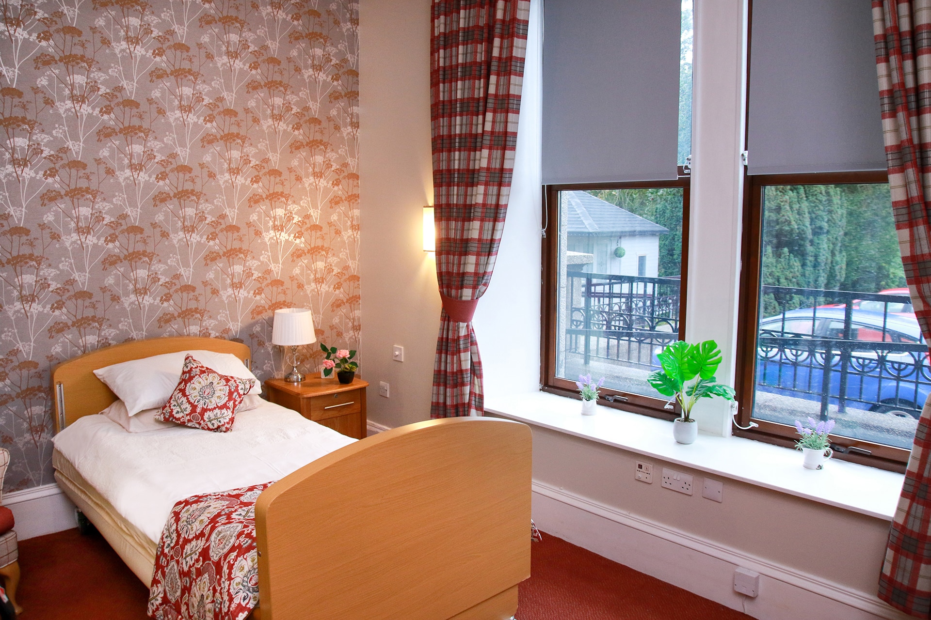 Show bedroom with large window at Cranford Care Home in Aberdeen.