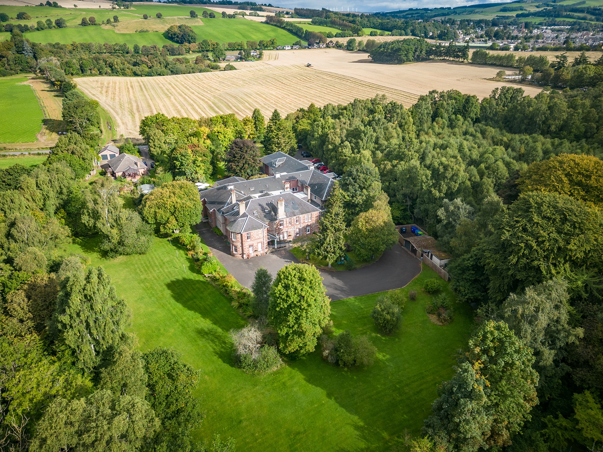 An aerial view of Muirton House Care Home in Blairgowrie and the surrounding countryside.