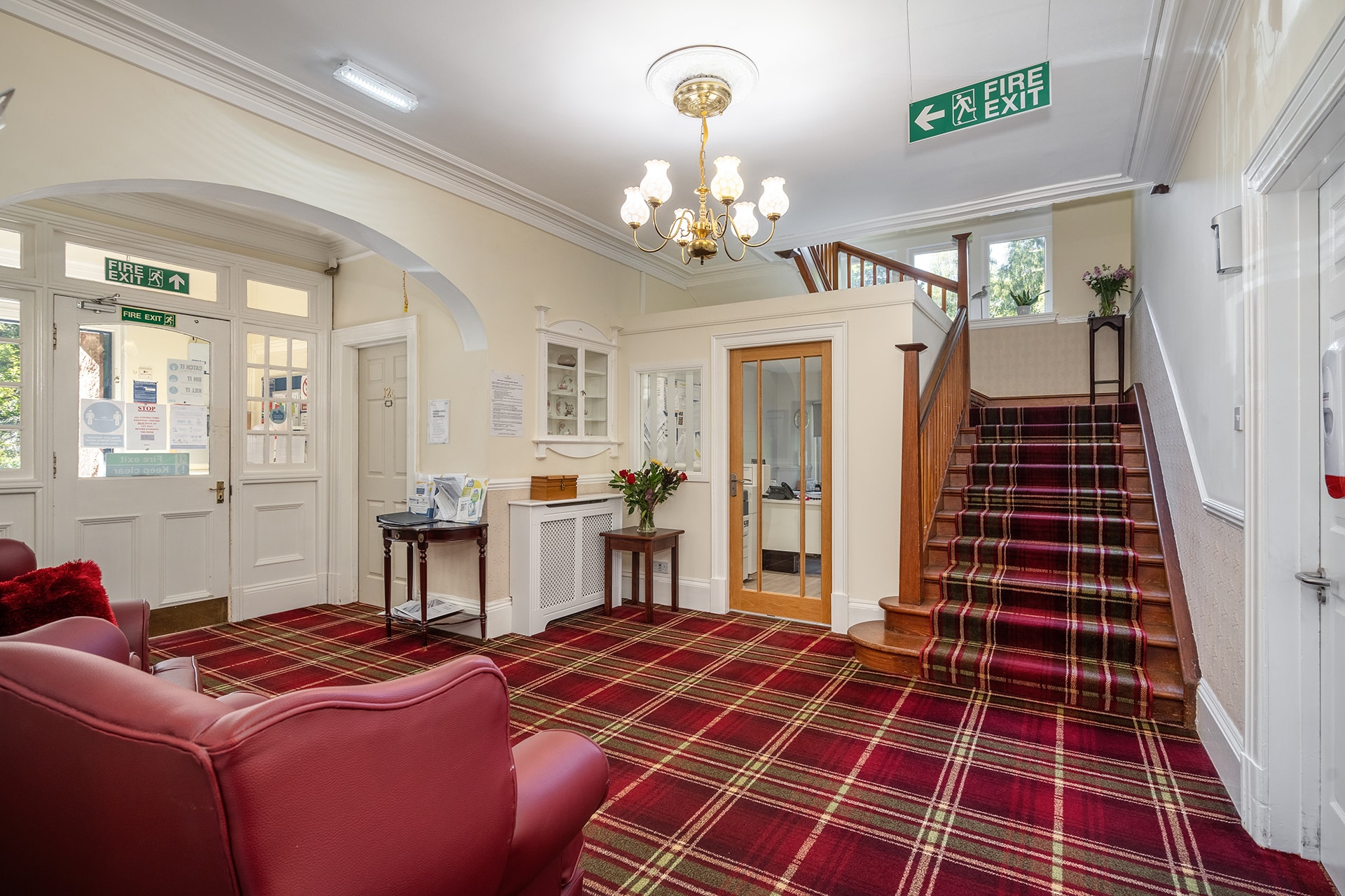 The grand entrance hall of Muirton House Care Home in Blairgowrie in the original part of the building. Complete with tartan carpet and oak staircase.
