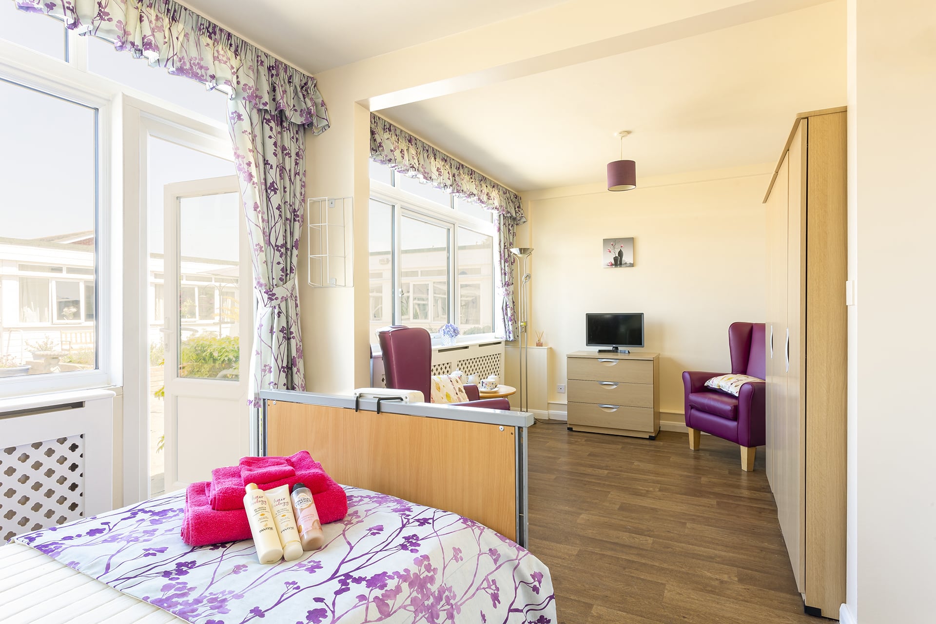 Large garden view bedroom at Cavell House Care Home in Shoreham-by-Sea.