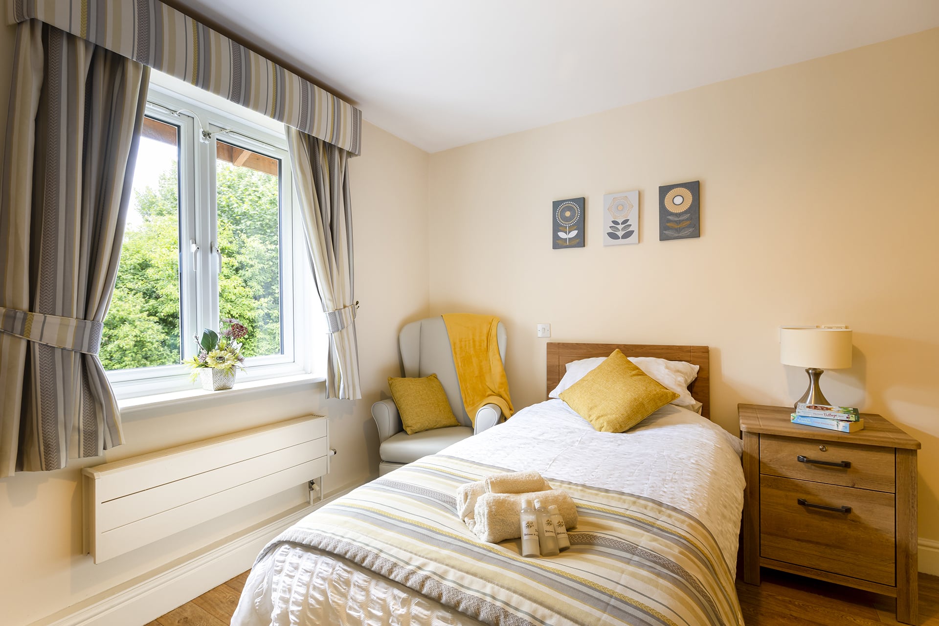 Bedroom with garden view at Lily House Care Home in Ely.