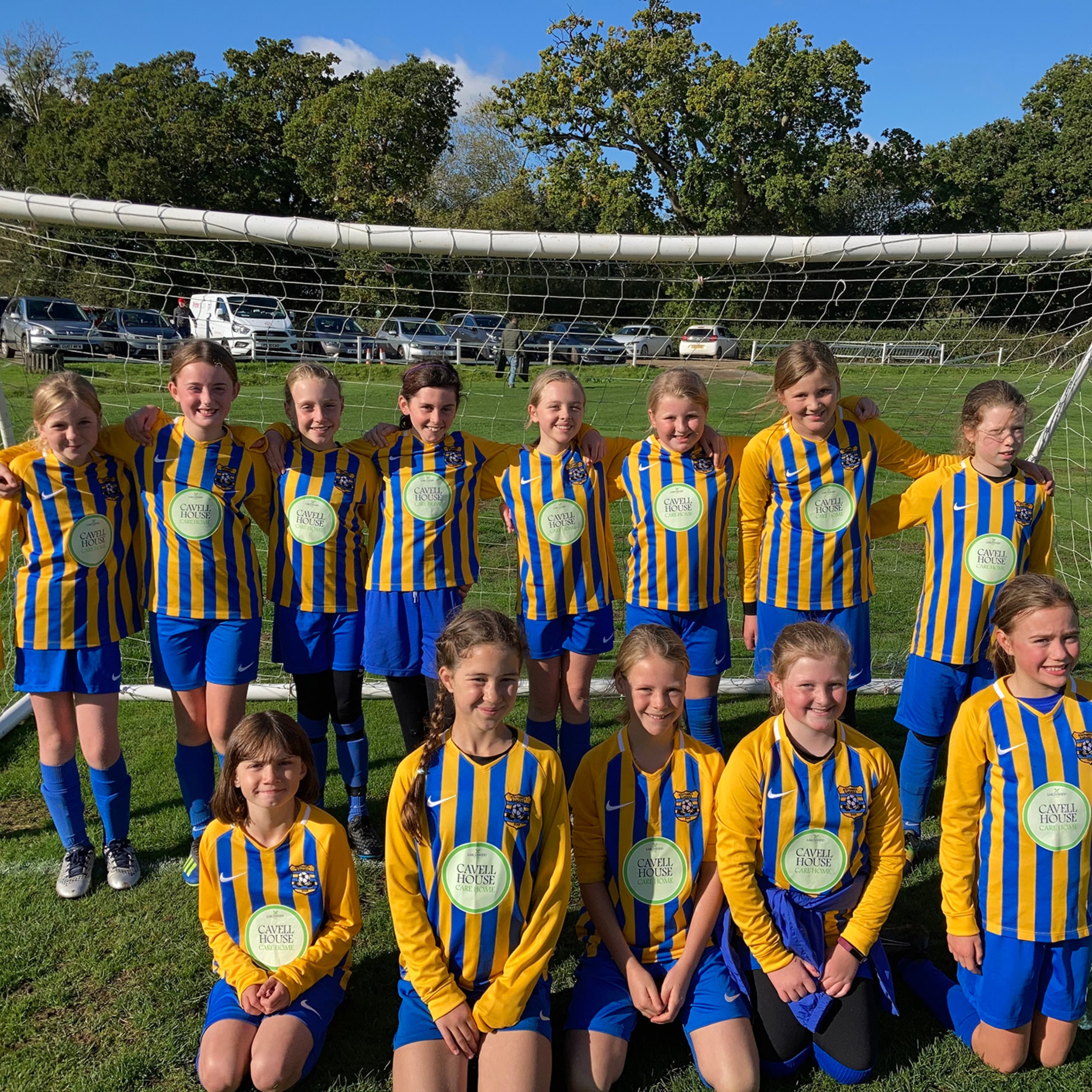 Southwick Rangers U11s girls’ team in their new kit sponsored by Cavell House Care Home.