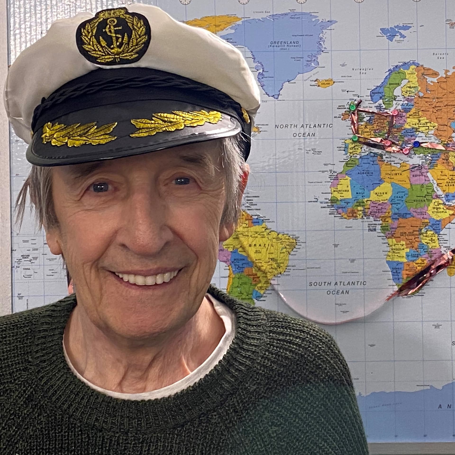 Kingsgate Care Home resident Stuart Duffy wearing the Captain's hat for the resident's virtual cruise.