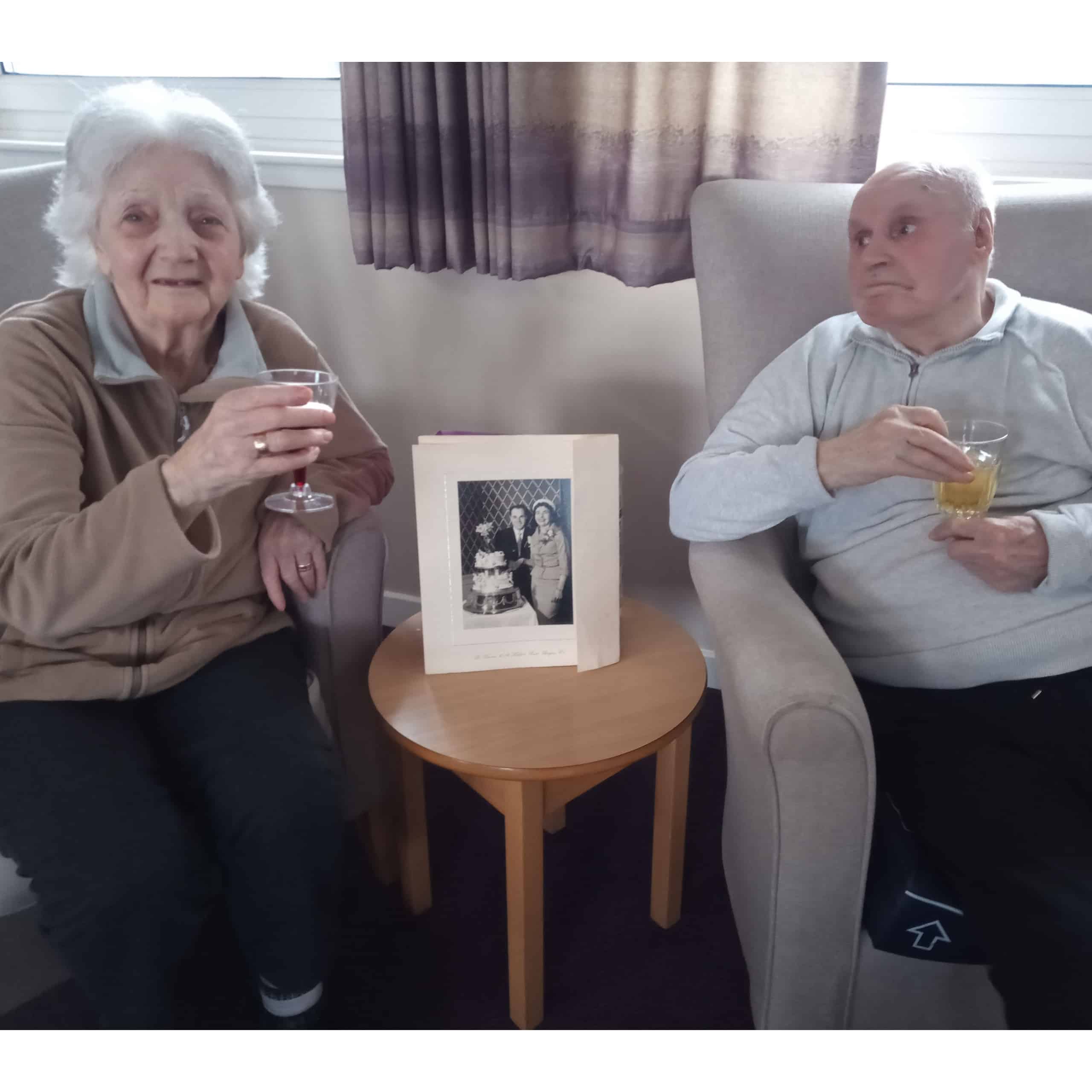 Kingsgate Care Home residents Helen and Danny Falloon with their wedding photo on their 63rd anniversary.