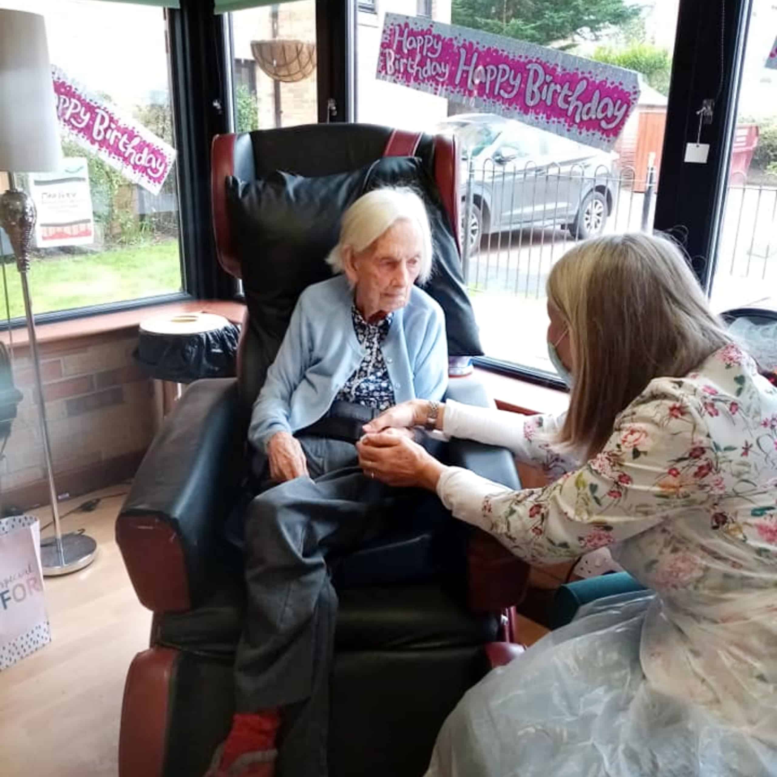 Eastwood Court Care Home resident Marjory Drysdale enjoying her first visit with her daughter Rhona Crosbie on her 101st birthday.
