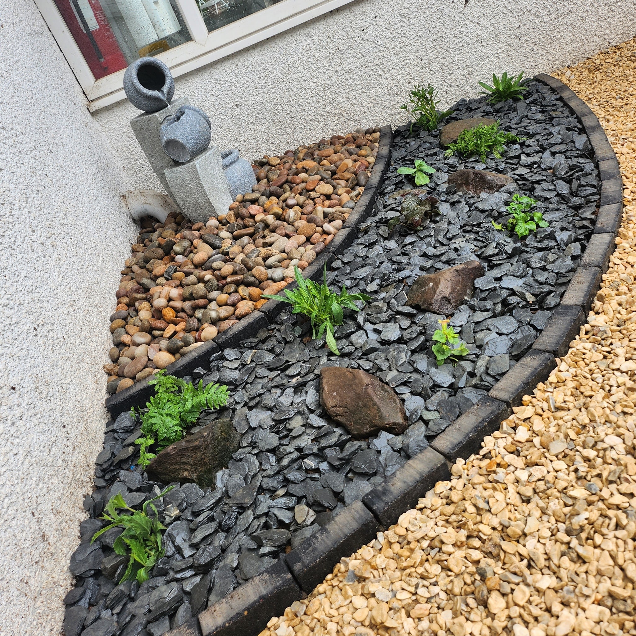 Water feature in rockery